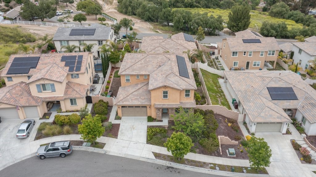 45522 Zander Court Temecula, CA 92592 - Photo 52 of 58 an aerial view of multiple houses with a yard
