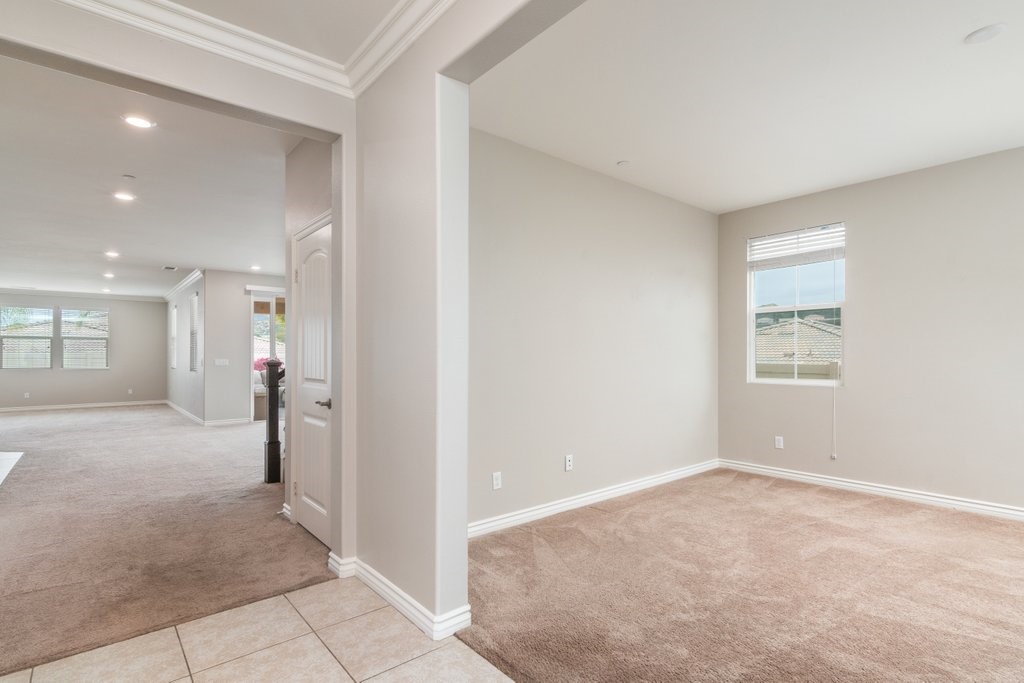 45522 Zander Court Temecula, CA 92592 - Photo 6 of 58 a view of a hallway with a livingroom and a window