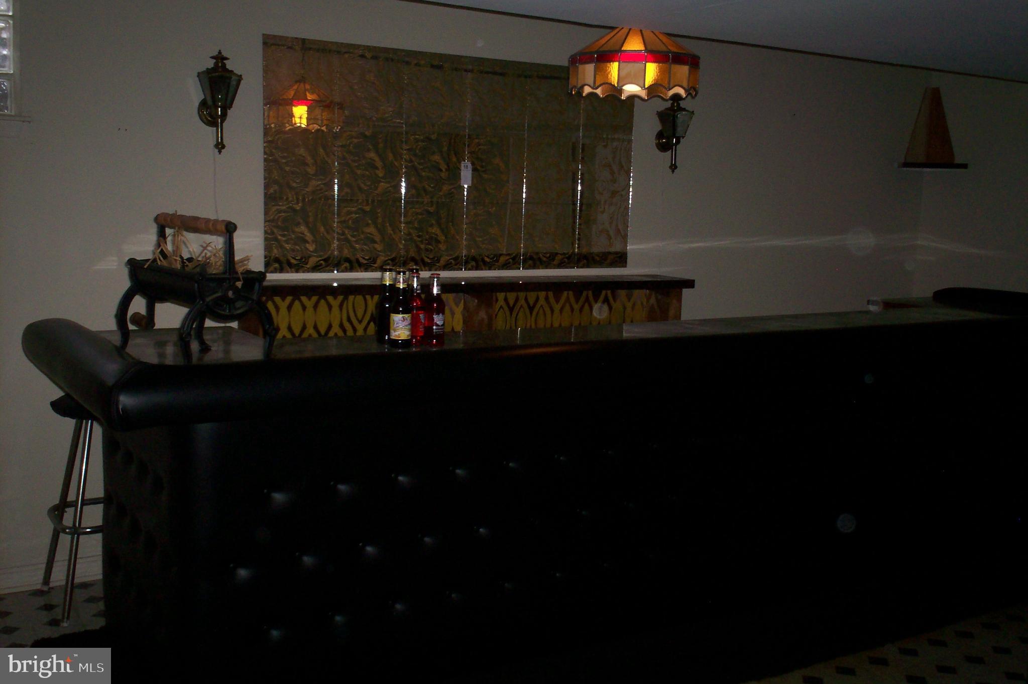 9201 Kilbride Road Nottingham, MD 21236 - Photo 14 of 14 a dining room with table and chairs