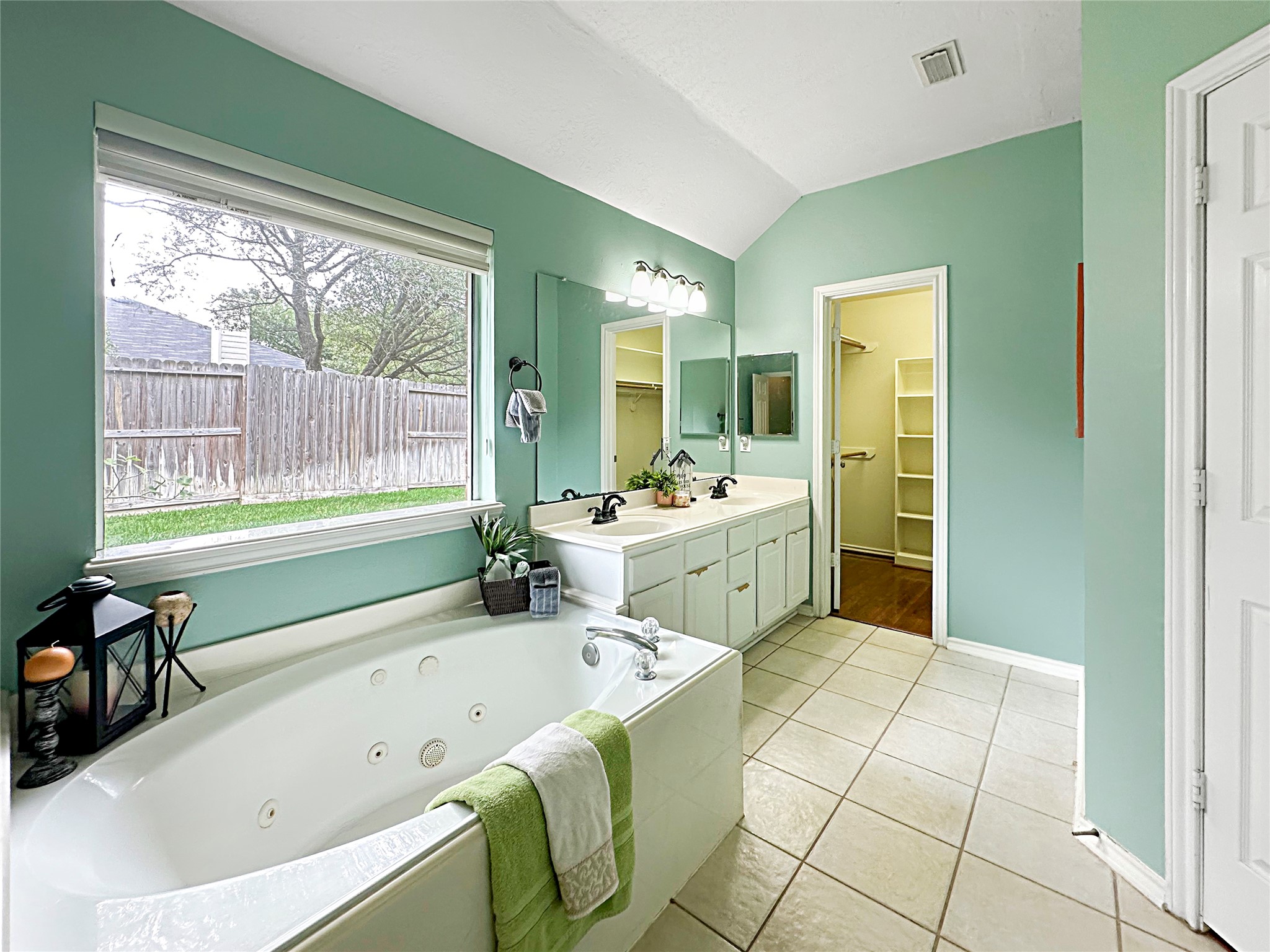 6506 Rustling Timbers Lane Spring, TX 77379 - Photo 21 of 40 Primary restroom is met with natural light and cozy vibes.