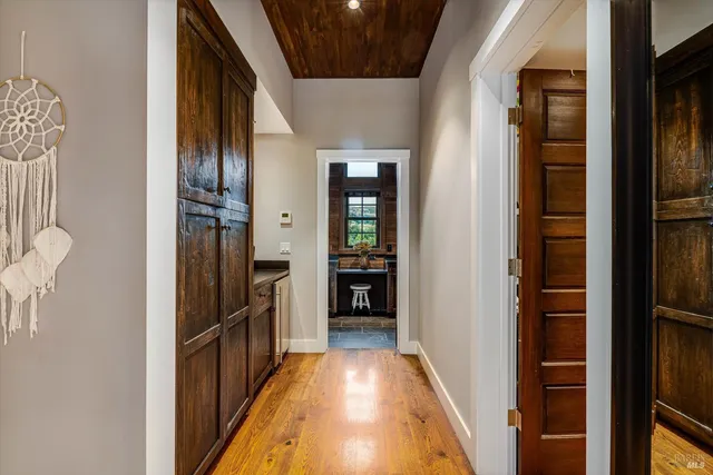 a bathroom with a sink double vanity granite tub shower and a mirror