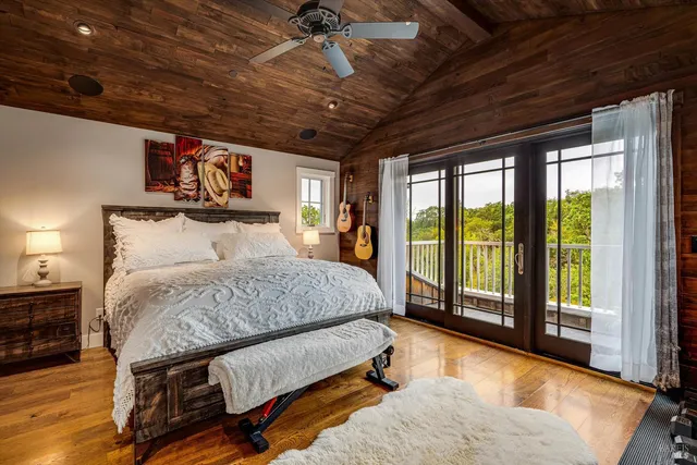 a room with gym equipment pool table and a table