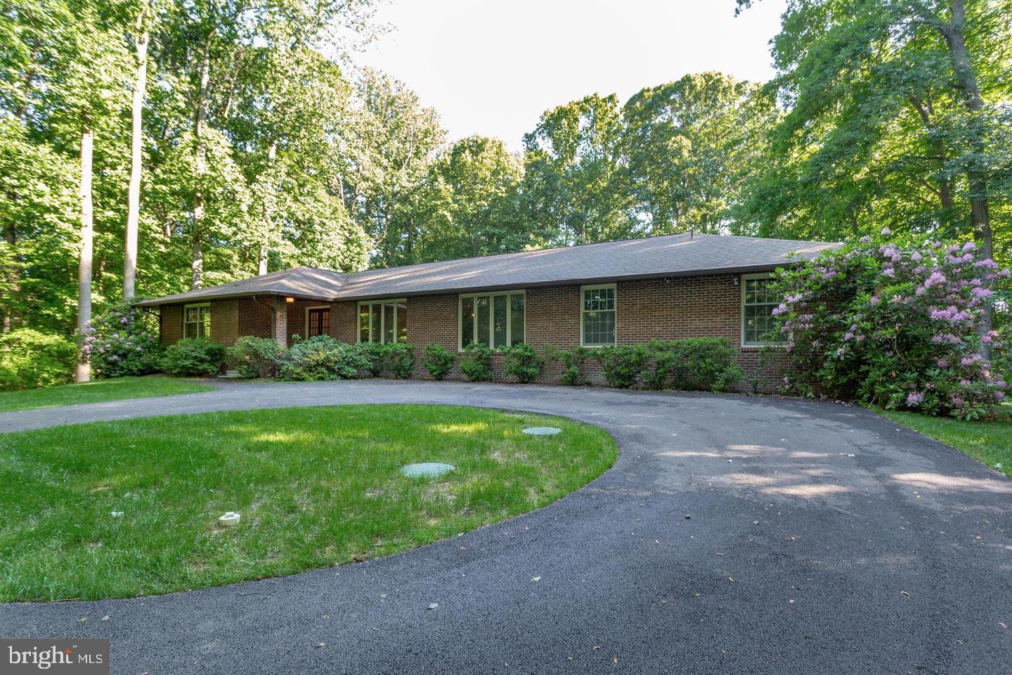 4304 Rousbys Run West River, MD 20778 - Photo 1 of 50 a view of a house with a yard