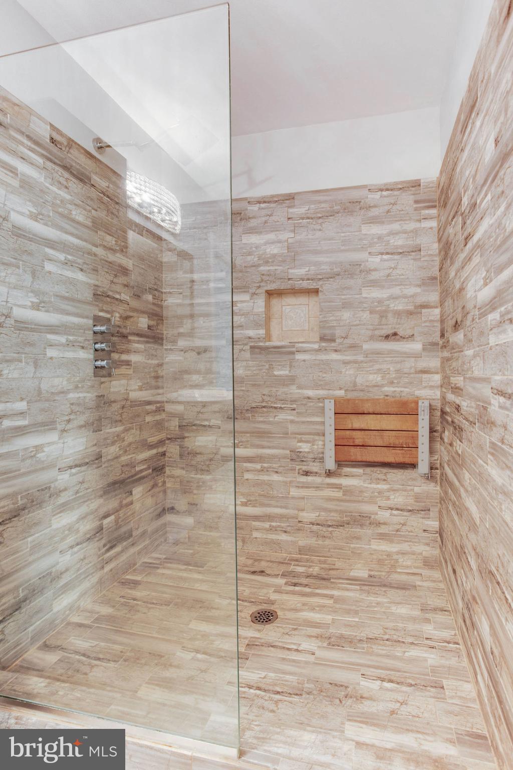 4304 Rousbys Run West River, MD 20778 - Photo 18 of 50 a bathroom with a shower