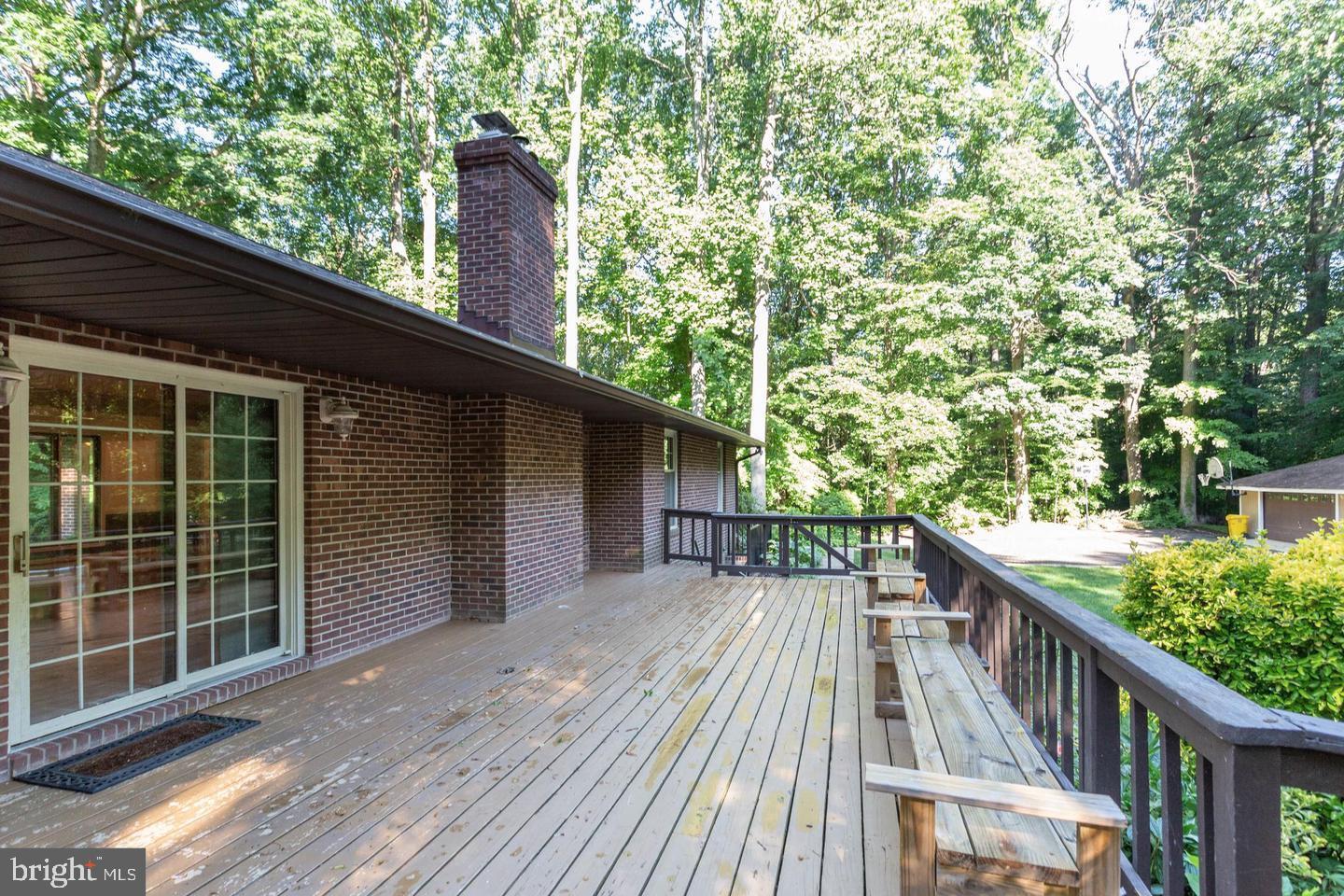 4304 Rousbys Run West River, MD 20778 - Photo 34 of 50 a view of balcony with wooden floor and fence