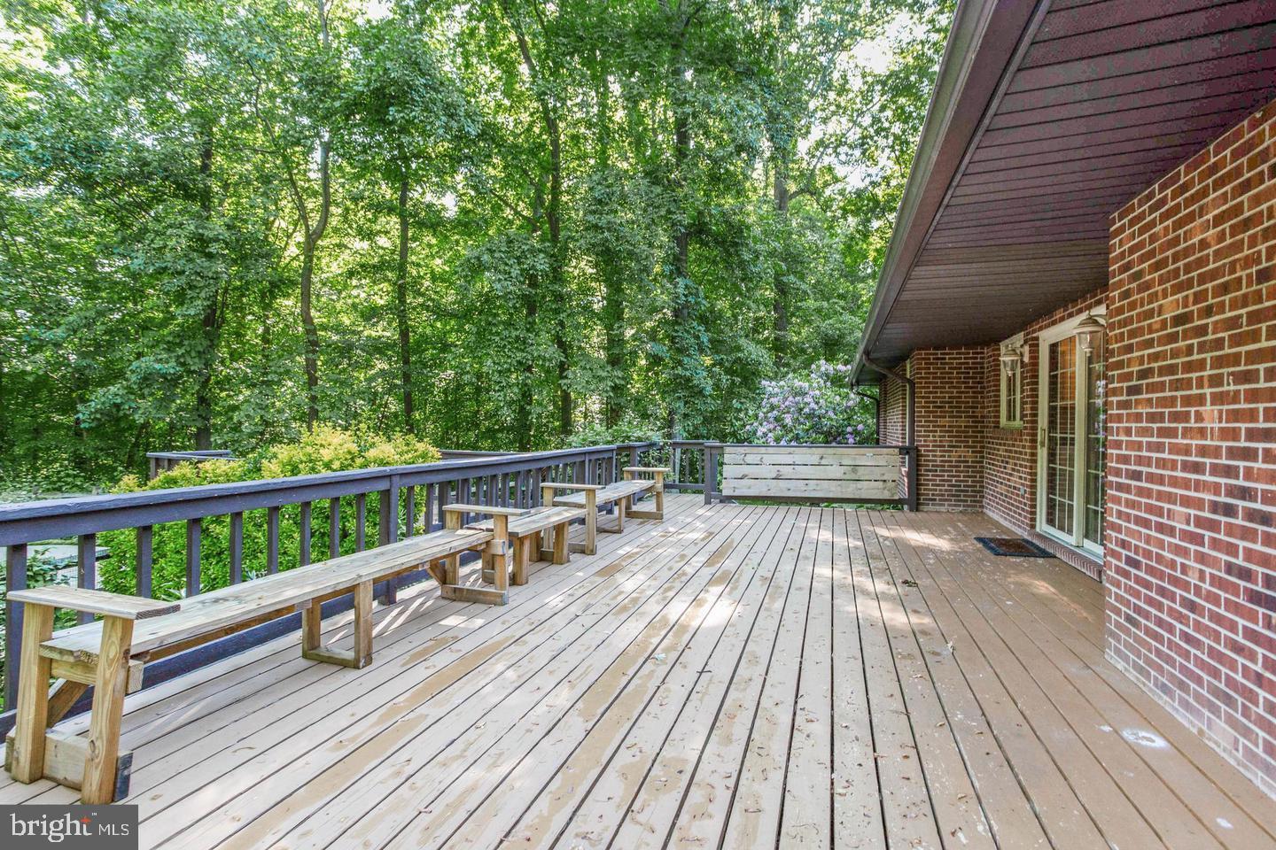 4304 Rousbys Run West River, MD 20778 - Photo 35 of 50 a view of balcony with deck and wooden floor