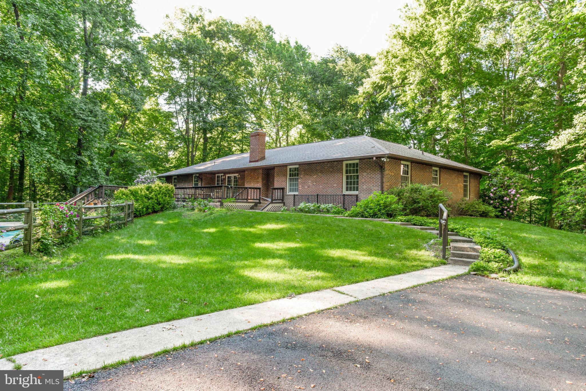 4304 Rousbys Run West River, MD 20778 - Photo 37 of 50 a view of house with backyard