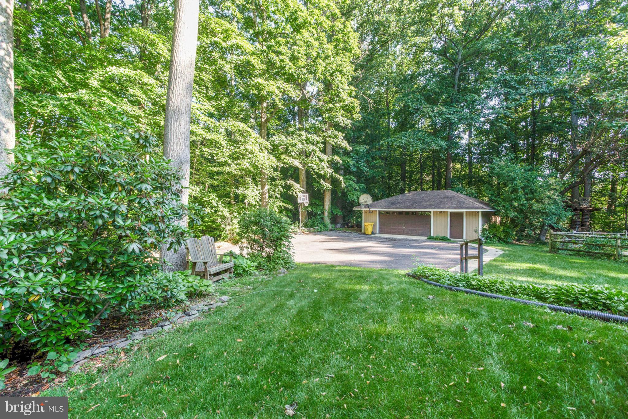 4304 Rousbys Run West River, MD 20778 - Photo 38 of 50 a view of a house with a yard