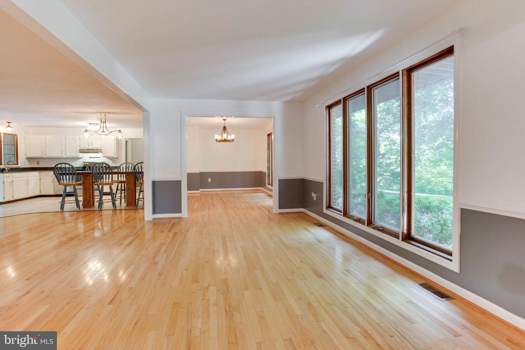4304 Rousbys Run West River, MD 20778 - Photo 5 of 50 a view of livingroom with furniture wooden floor and windows