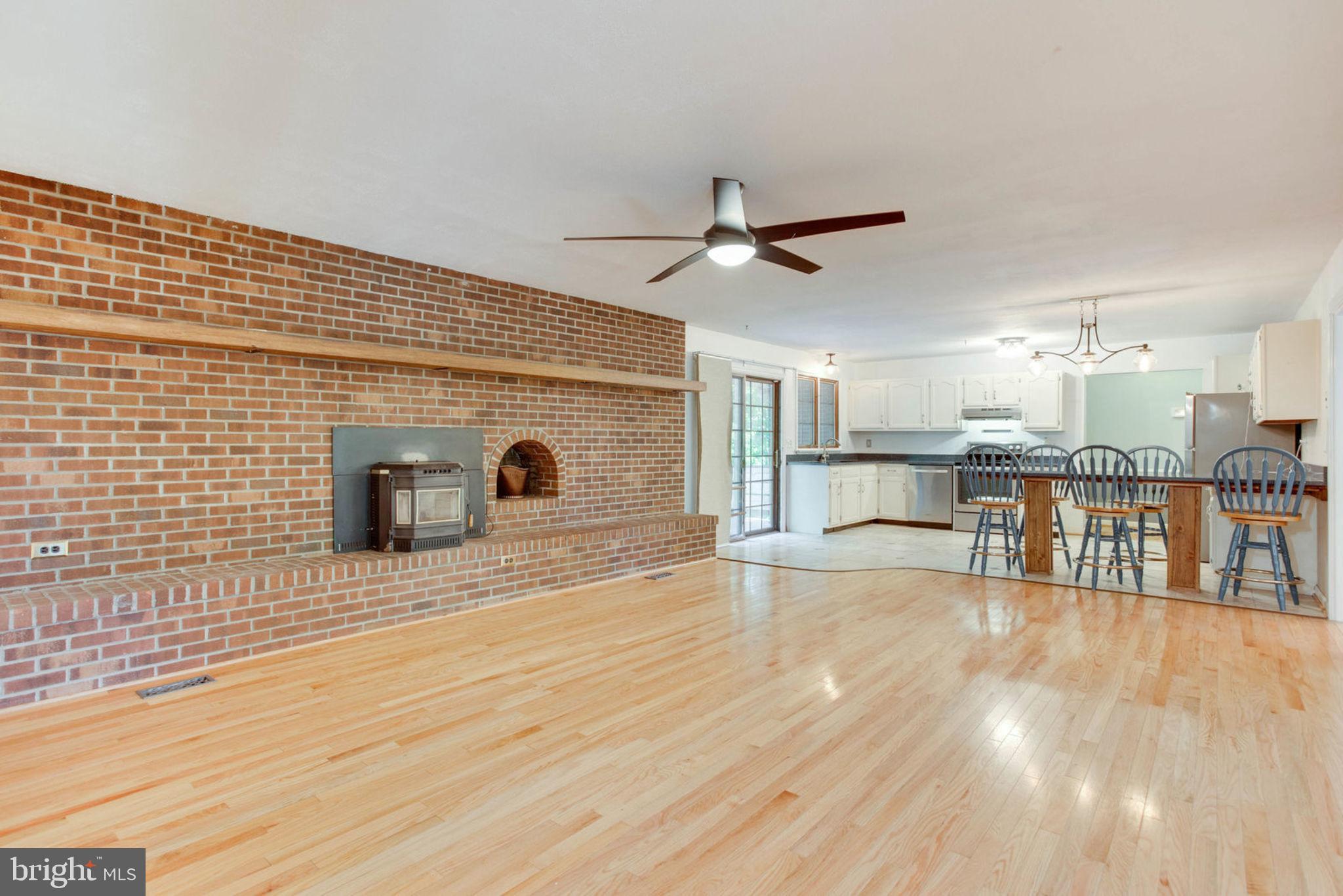 4304 Rousbys Run West River, MD 20778 - Photo 10 of 50 a view of a livingroom with a fireplace