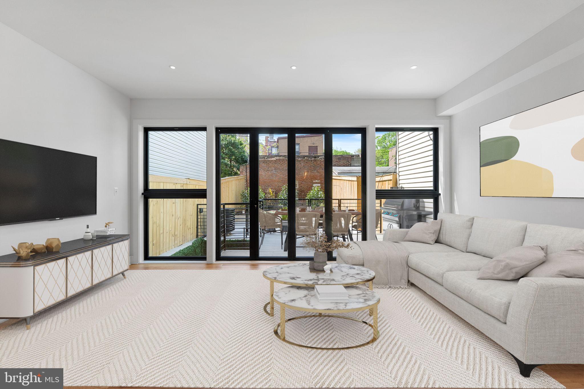 1414 5th Street Northwest, Unit A Washington, DC 20001 - Photo 14 of 62 Living Room w/Floor to Ceiling Windows/Doors
