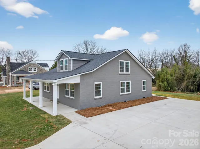 a house view with a garden space