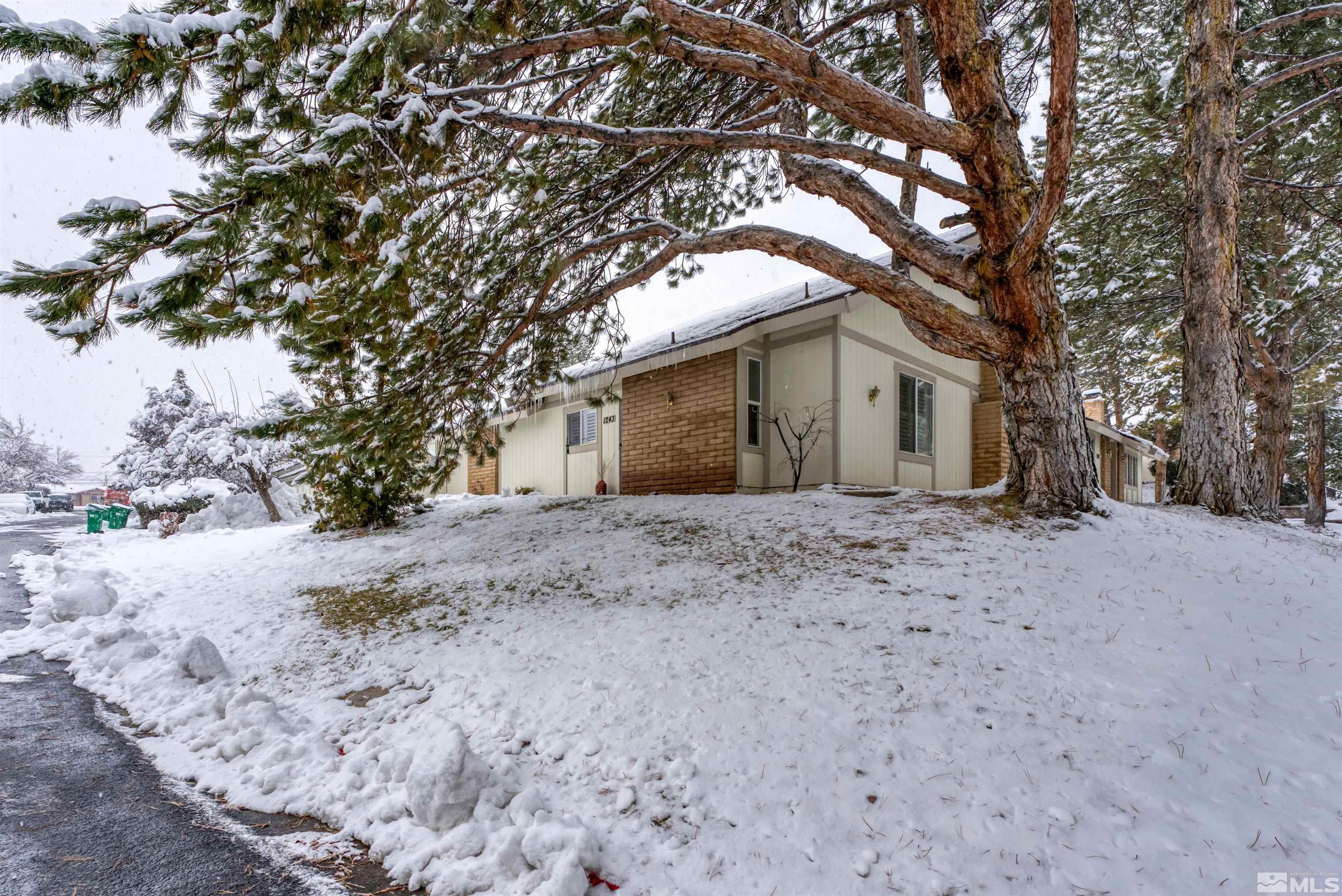 1243 Laredo Court Reno, NV 89503 - Photo 1 of 20 a view of a house with a yard