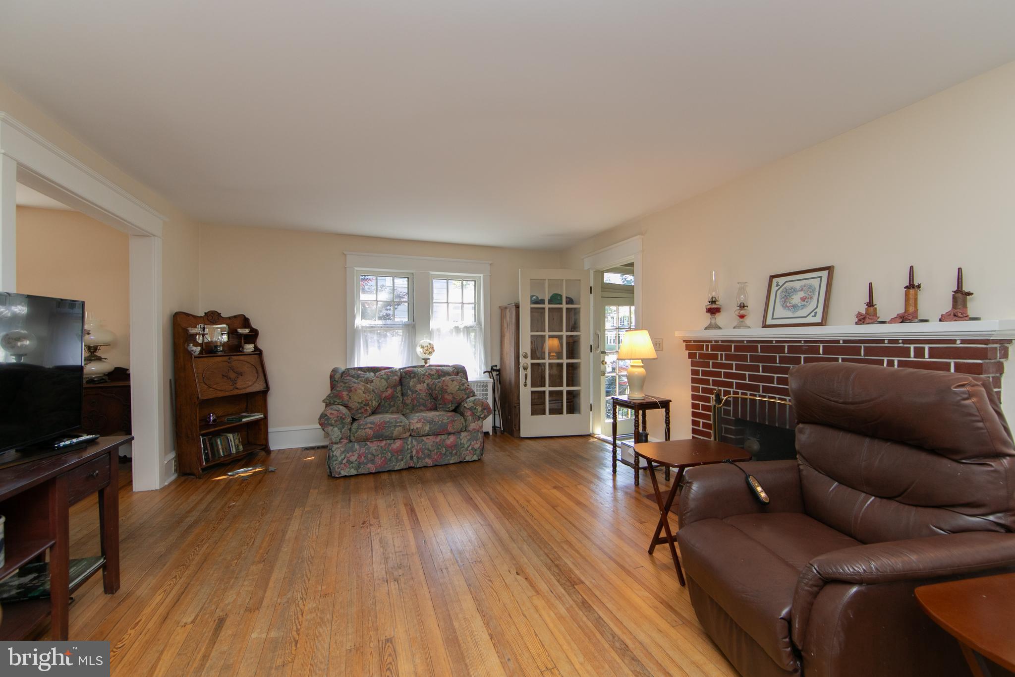 237 Rhoads Avenue Haddonfield, NJ 08033 - Photo 9 of 47 Living room with woodburning fireplace