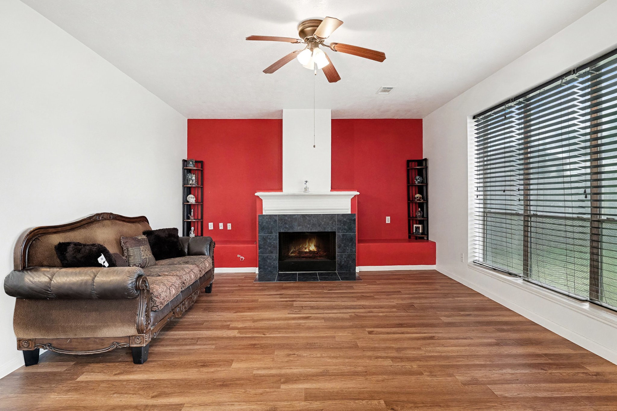 12411 Wright Oaks Drive Houston, TX 77014 - Photo 11 of 29 a living room with furniture and a fireplace