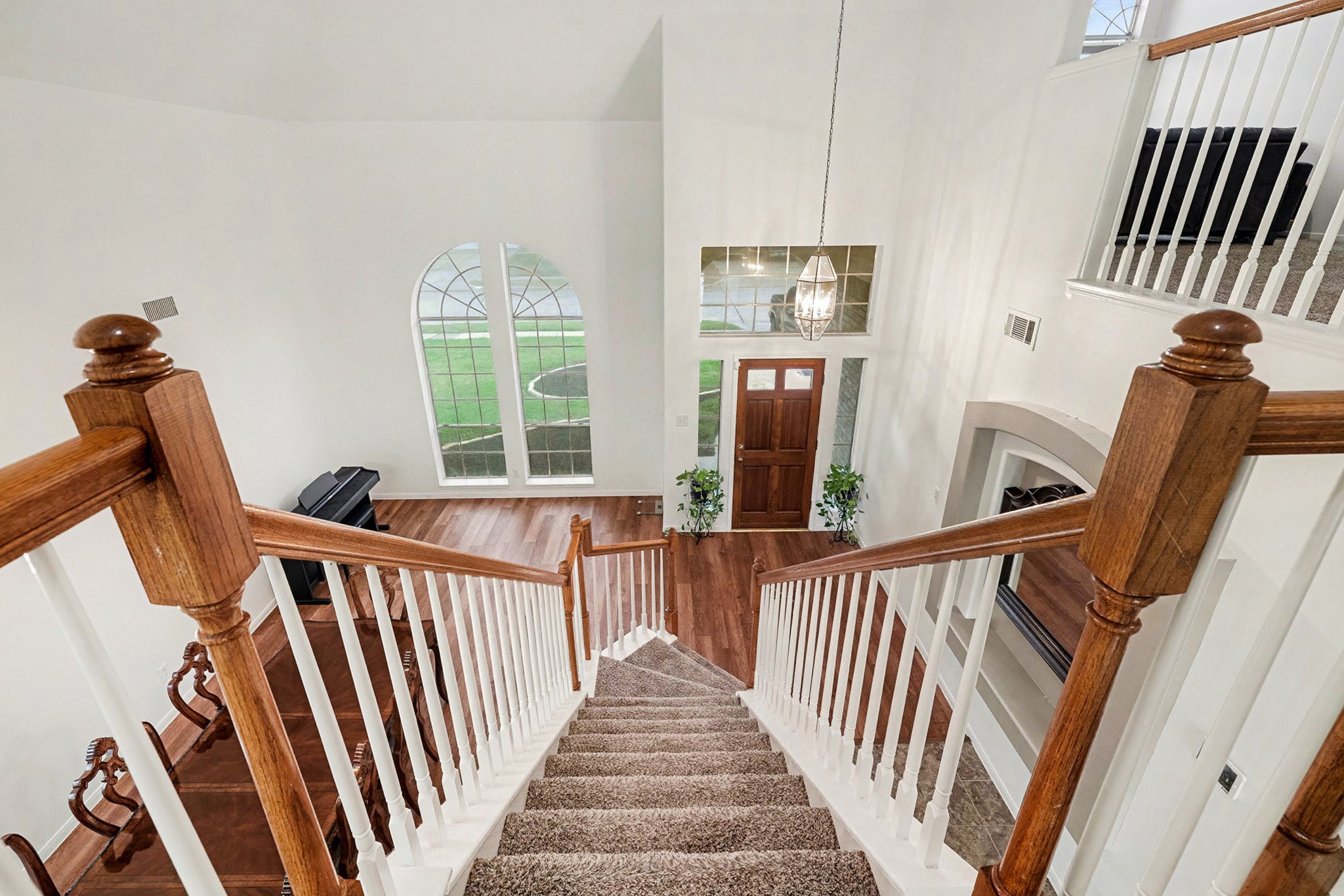 12411 Wright Oaks Drive Houston, TX 77014 - Photo 17 of 29 a view of a balcony with furniture and stairs