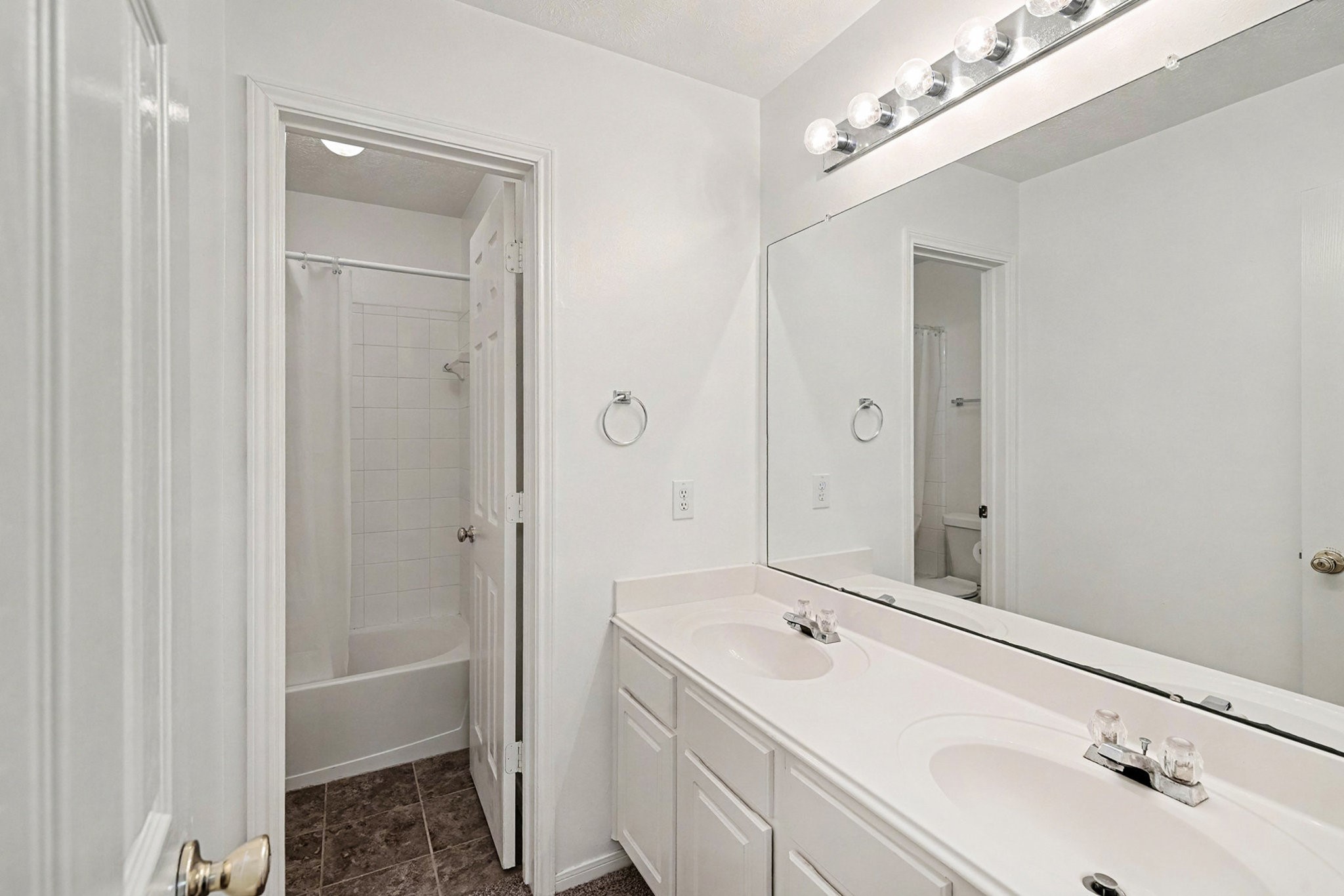 12411 Wright Oaks Drive Houston, TX 77014 - Photo 27 of 29 a bathroom with a double vanity sink and mirror