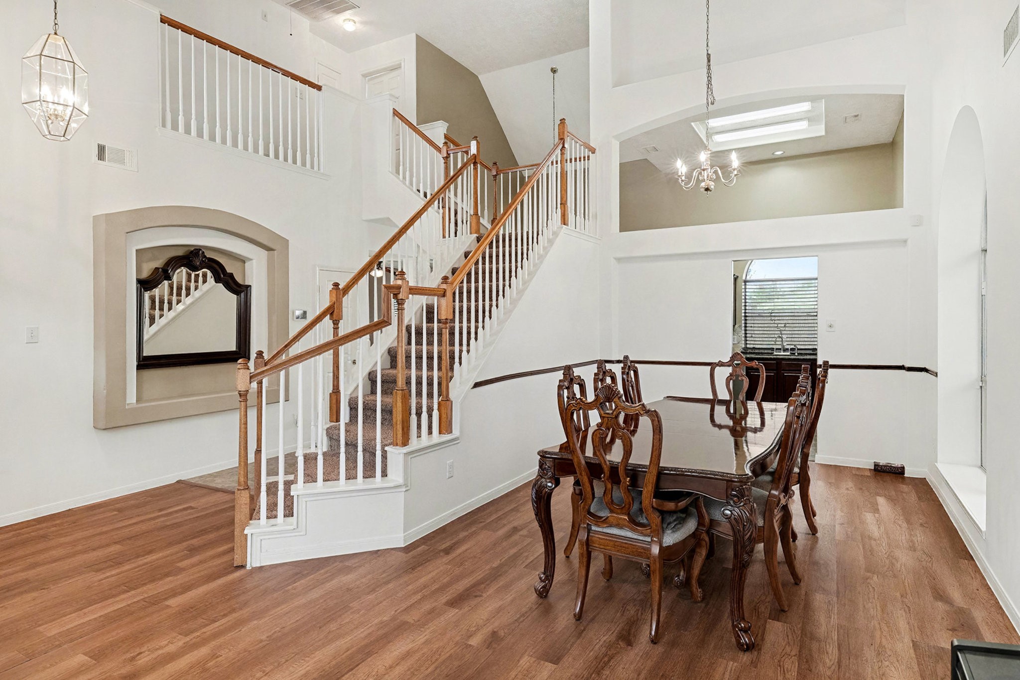 12411 Wright Oaks Drive Houston, TX 77014 - Photo 7 of 29 a view of a dining room with furniture and wooden floor
