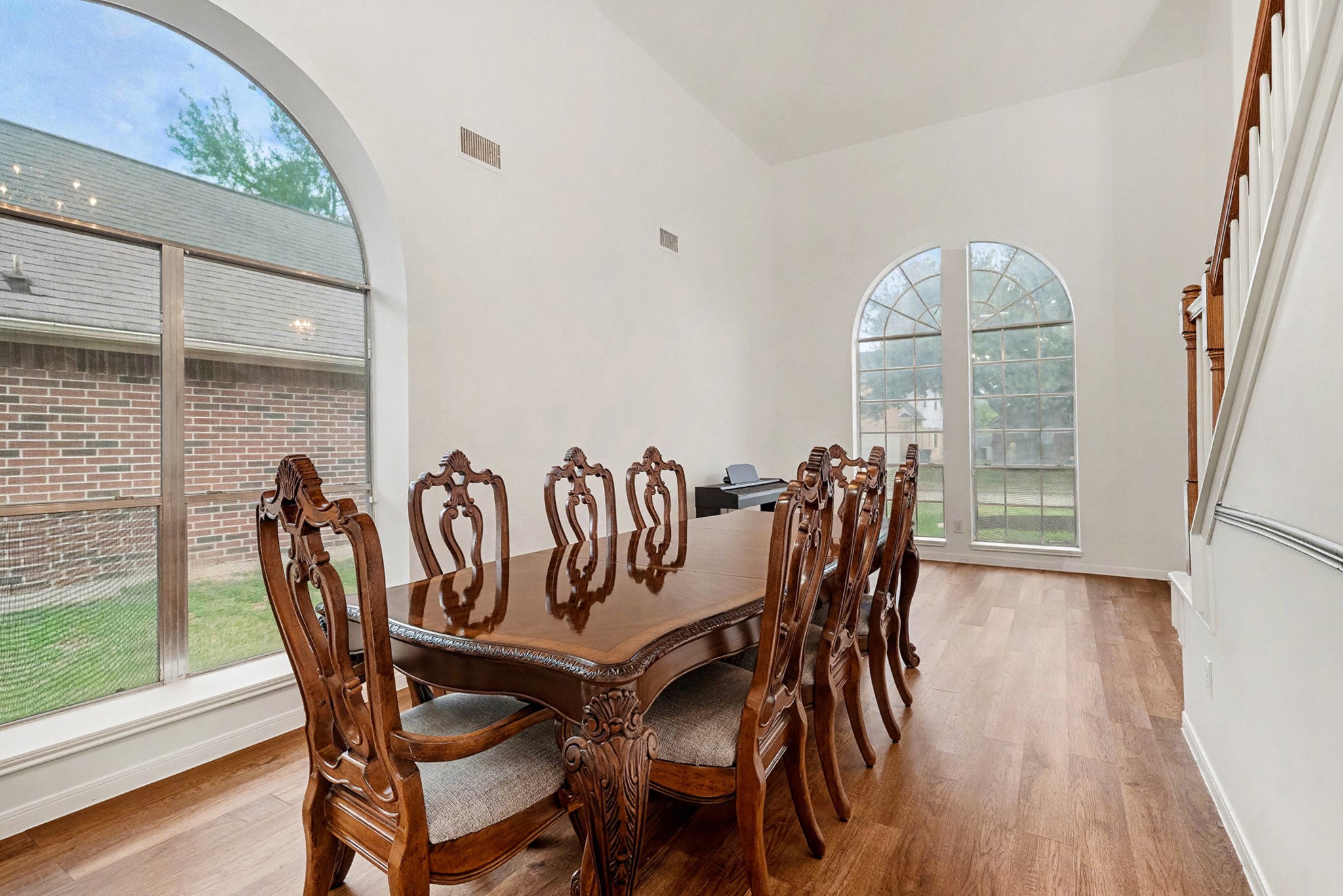 12411 Wright Oaks Drive Houston, TX 77014 - Photo 8 of 29 a view of a dining room with furniture window and wooden floor