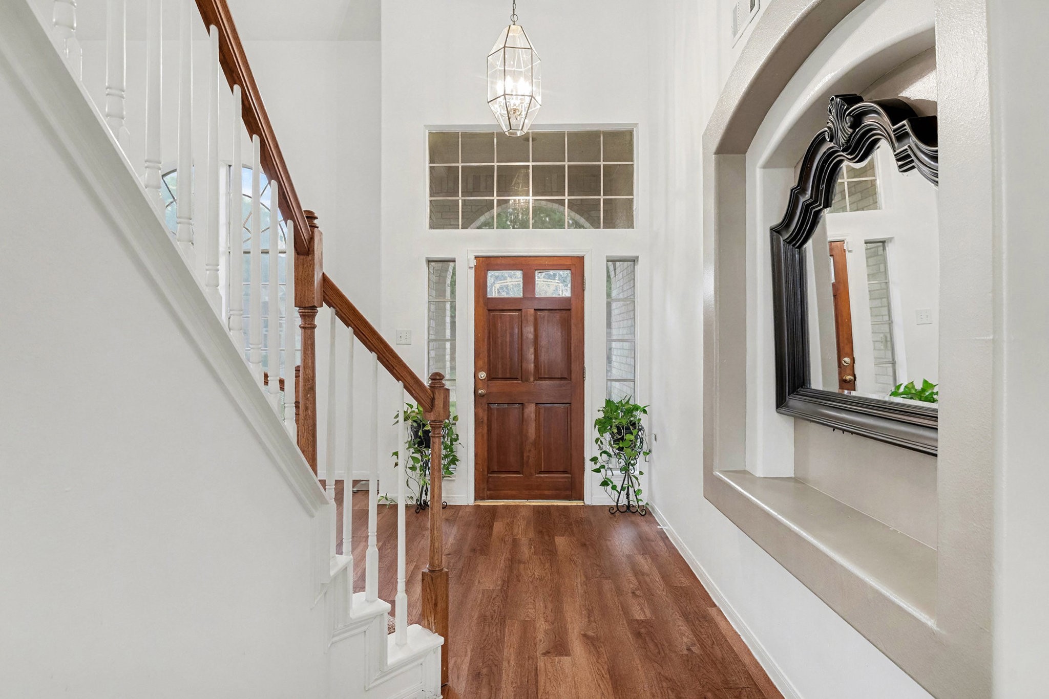 12411 Wright Oaks Drive Houston, TX 77014 - Photo 9 of 29 a view of front door and wooden floor