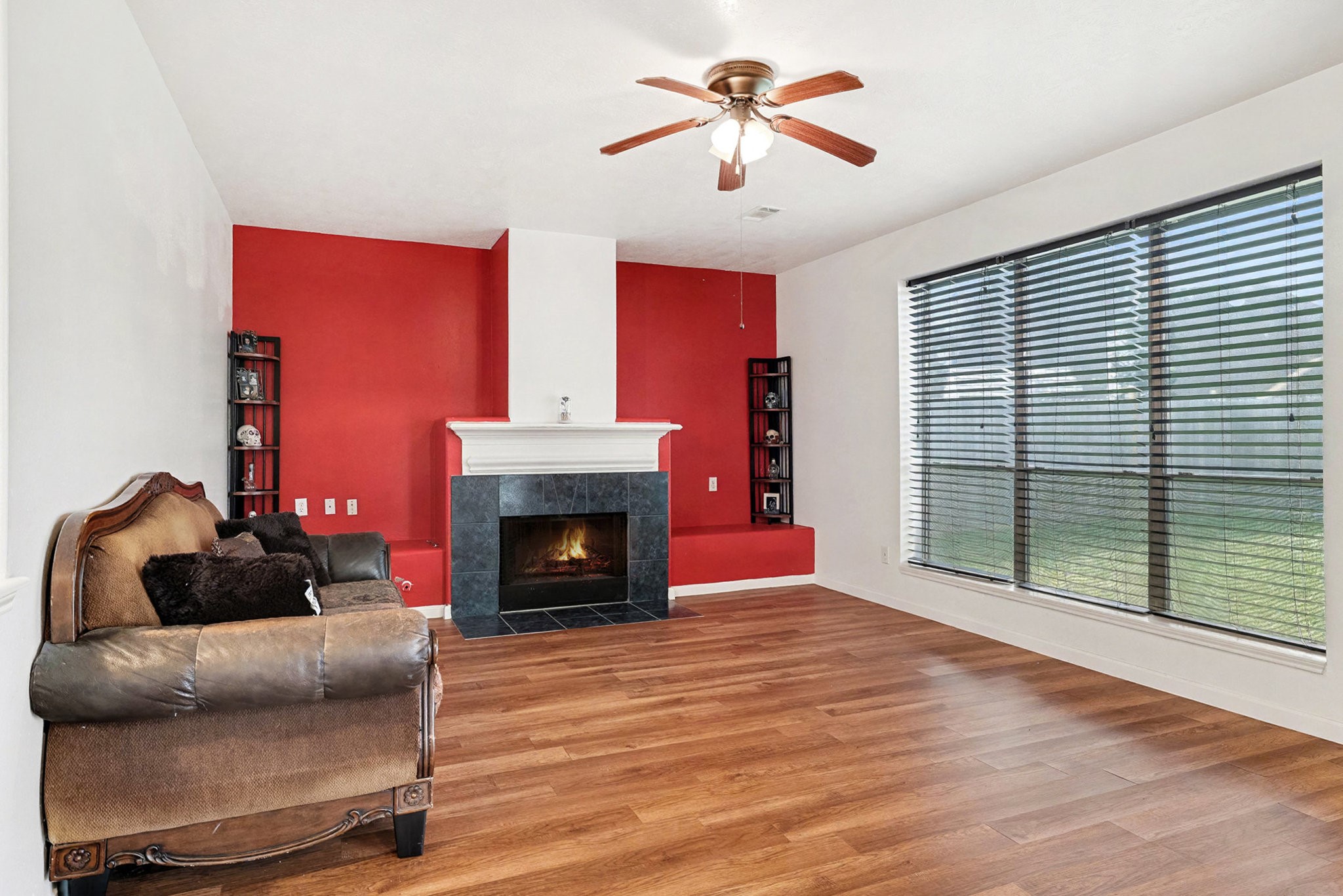 12411 Wright Oaks Drive Houston, TX 77014 - Photo 10 of 29 a living room with furniture and a fireplace