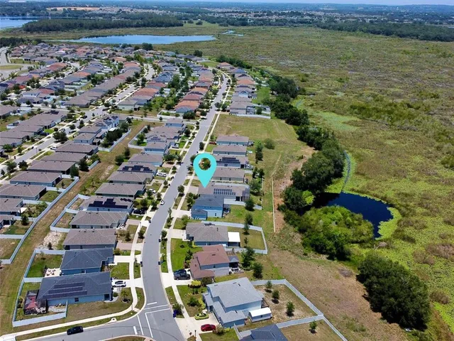 a view of a city with an ocean view