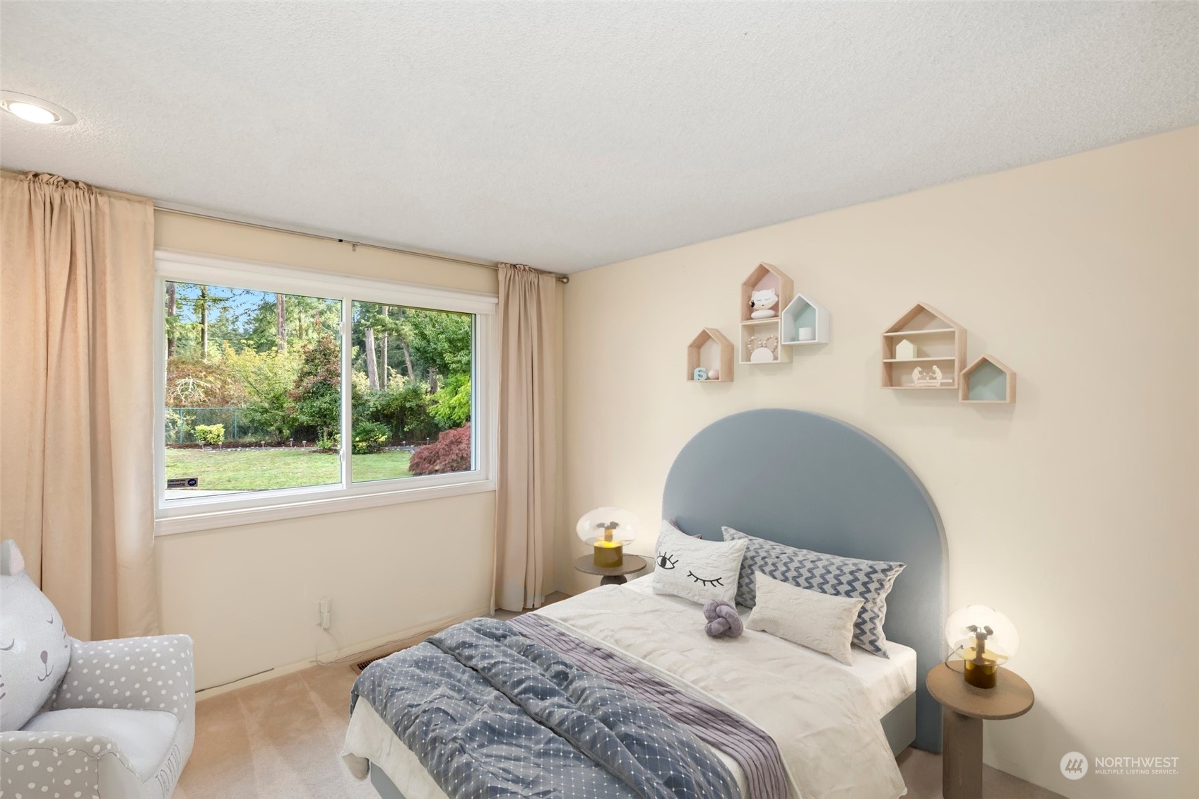 12730 Southeast 95th Place Renton, WA 98056 - Photo 23 of 38 a bedroom with a bed and a window