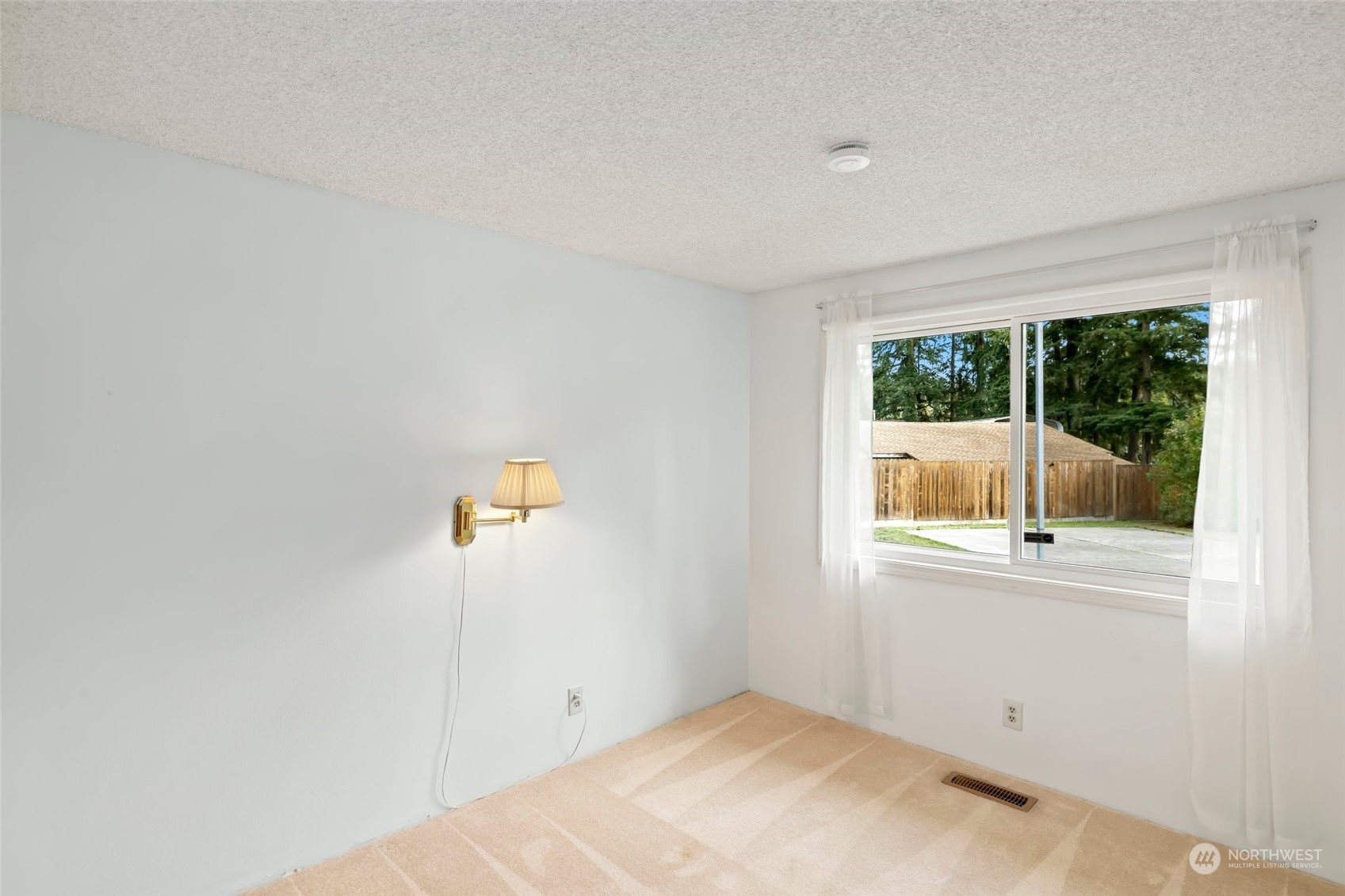 12730 Southeast 95th Place Renton, WA 98056 - Photo 26 of 38 an empty room with a window