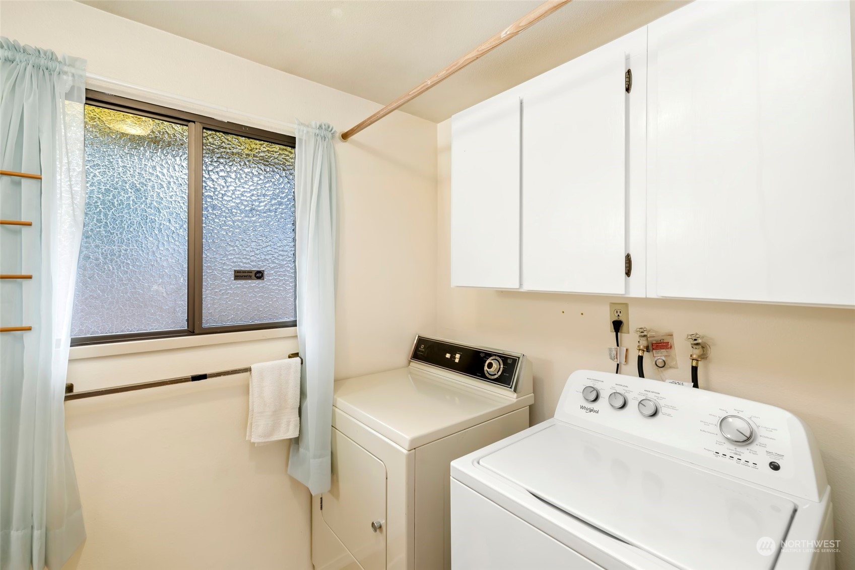12730 Southeast 95th Place Renton, WA 98056 - Photo 29 of 38 a utility room with dryer and washer