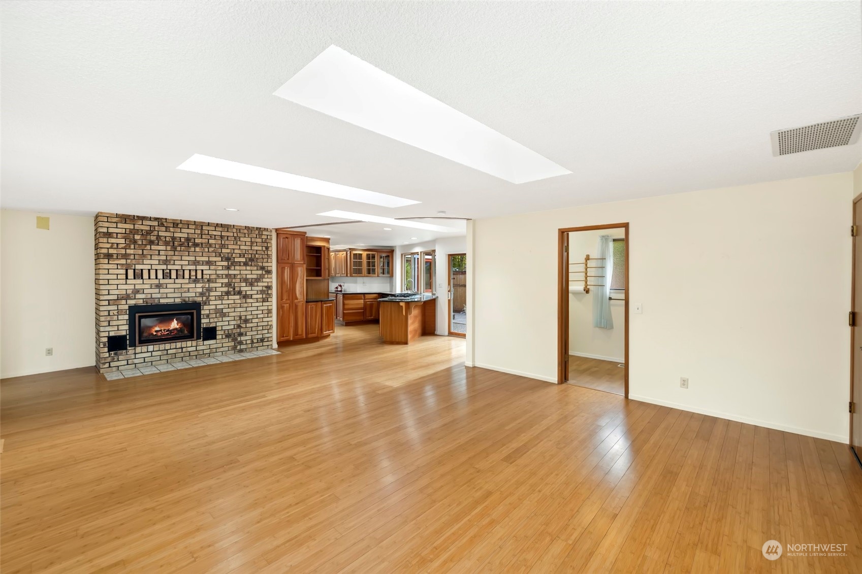 12730 Southeast 95th Place Renton, WA 98056 - Photo 3 of 38 a view of an empty room with a fireplace