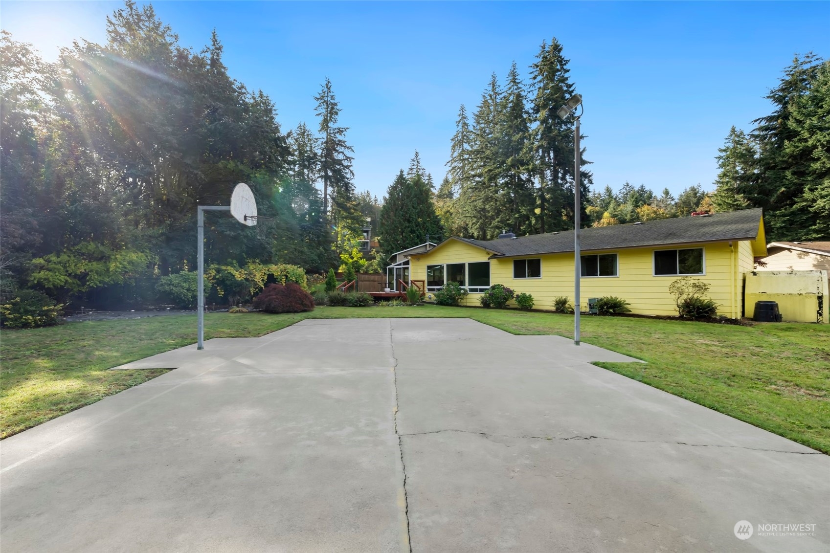 12730 Southeast 95th Place Renton, WA 98056 - Photo 34 of 38 a front view of a house with a yard and garage
