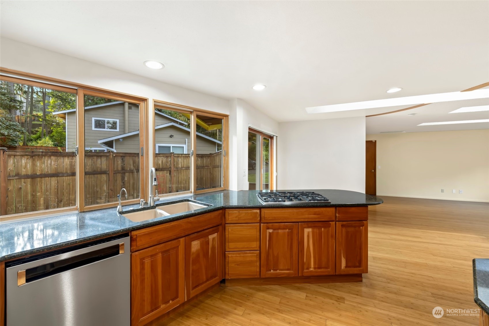 12730 Southeast 95th Place Renton, WA 98056 - Photo 8 of 38 a view of a kitchen with a sink and large window