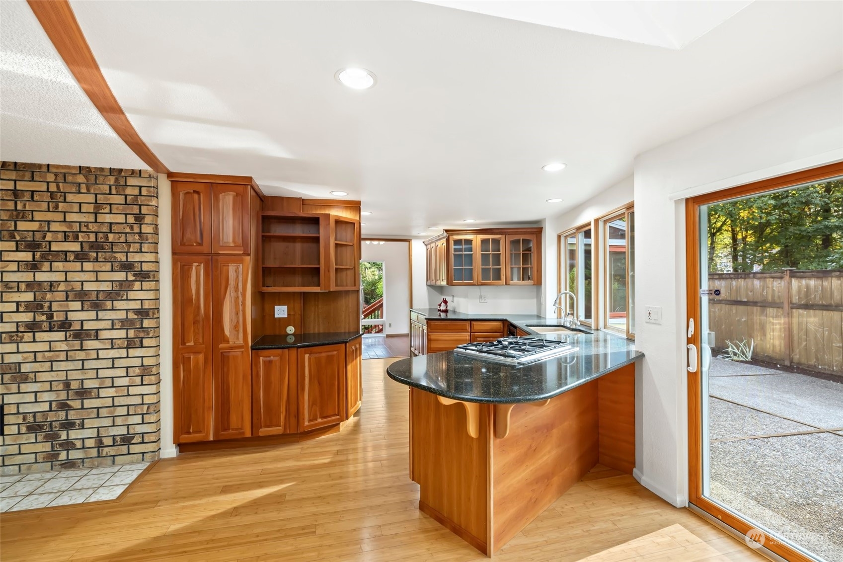 12730 Southeast 95th Place Renton, WA 98056 - Photo 9 of 38 a kitchen with refrigerator and window