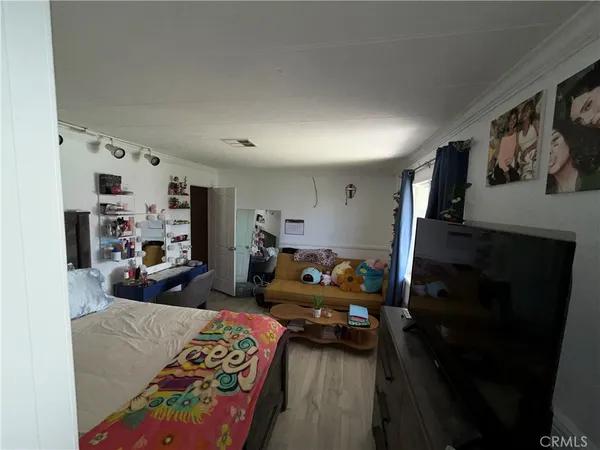 a bed room with furniture and a couch