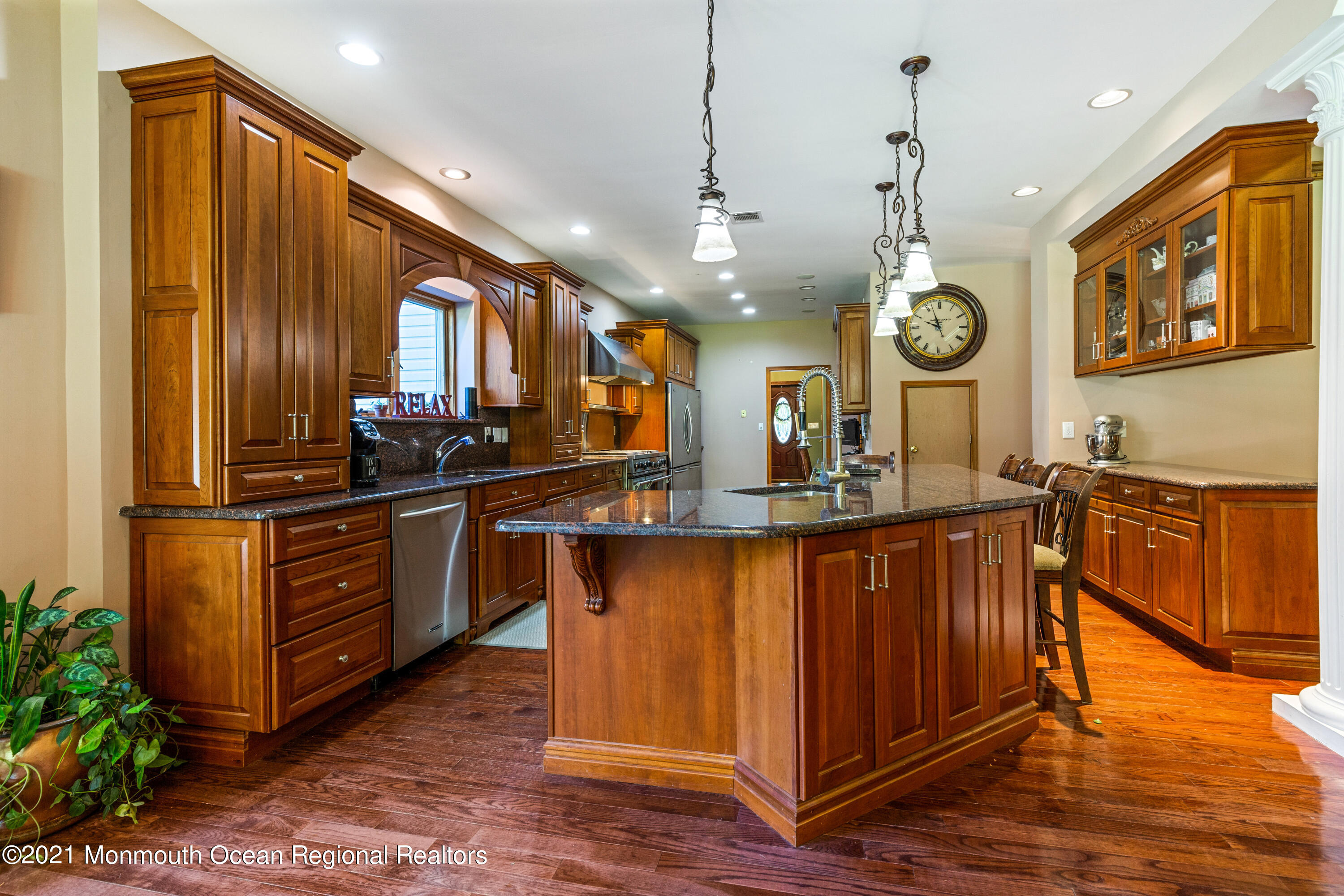 363 Lanes Pond Road Howell, NJ 07731 - Photo 14 of 72 a kitchen with stainless steel appliances granite countertop a stove a sink and a wooden floors