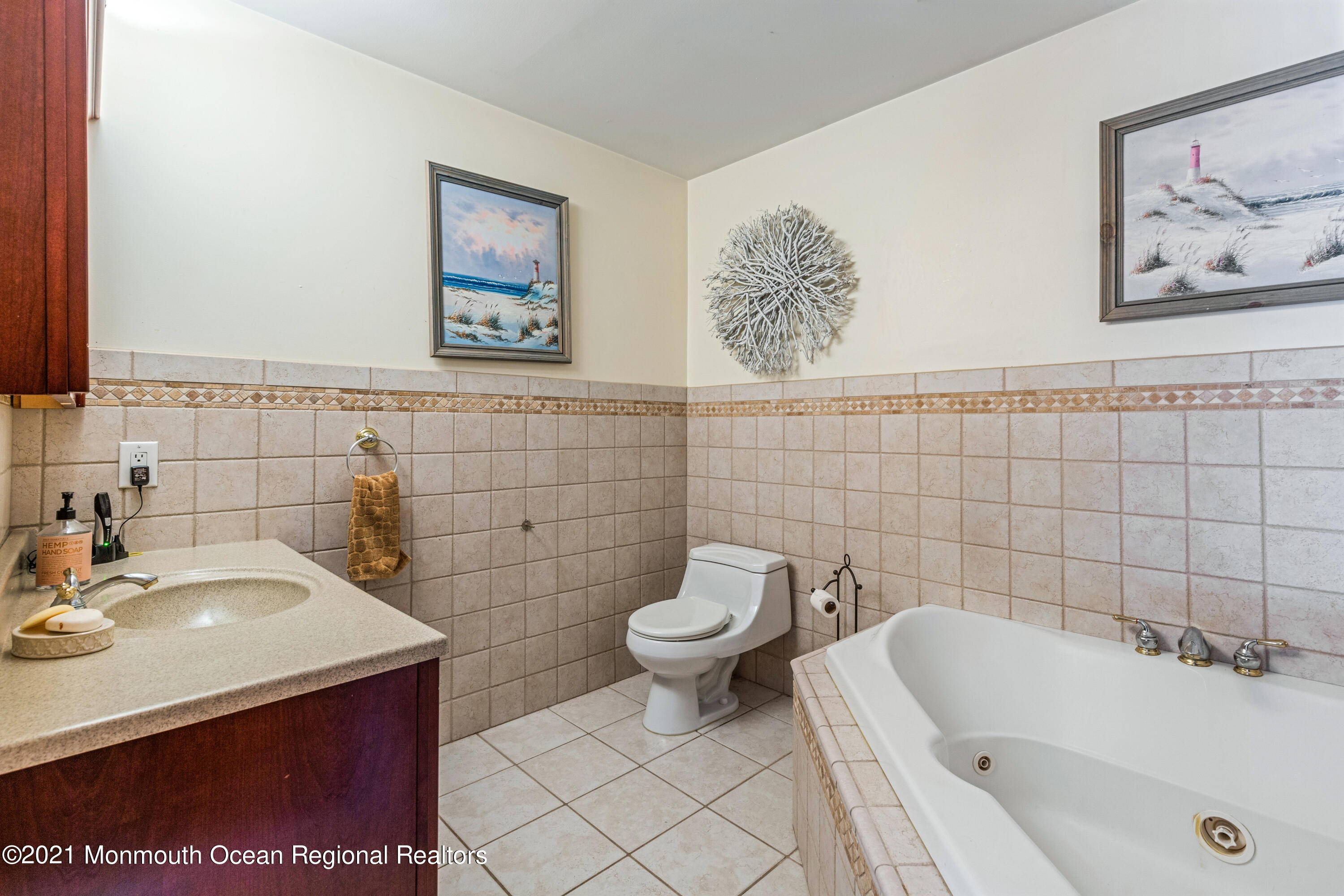 363 Lanes Pond Road Howell, NJ 07731 - Photo 50 of 72 a bathroom with a sink and a toilet