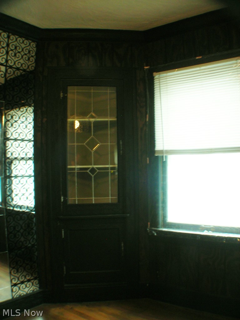 800 Hoover Road Cleveland, OH 44119 - Photo 4 of 13 Built in corner cabinets in the dining room flanking the windows.