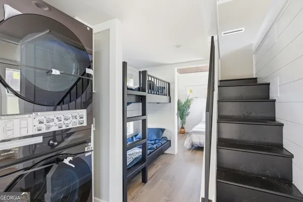 a kitchen view with a stove and a refrigerator