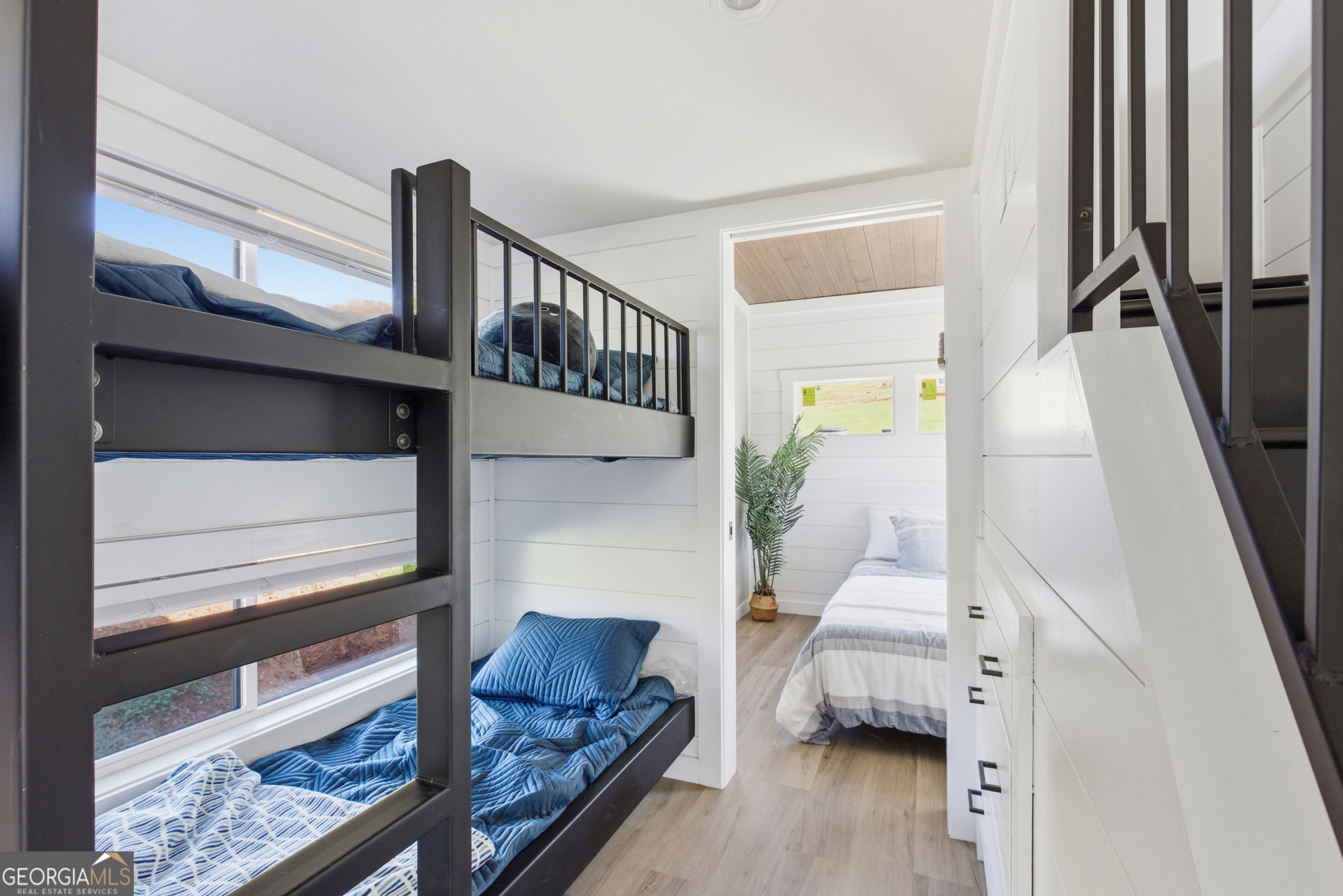 527 Saunders Road Franklin, NC 28734 - Photo 12 of 20 a living room with furniture and a wooden floor