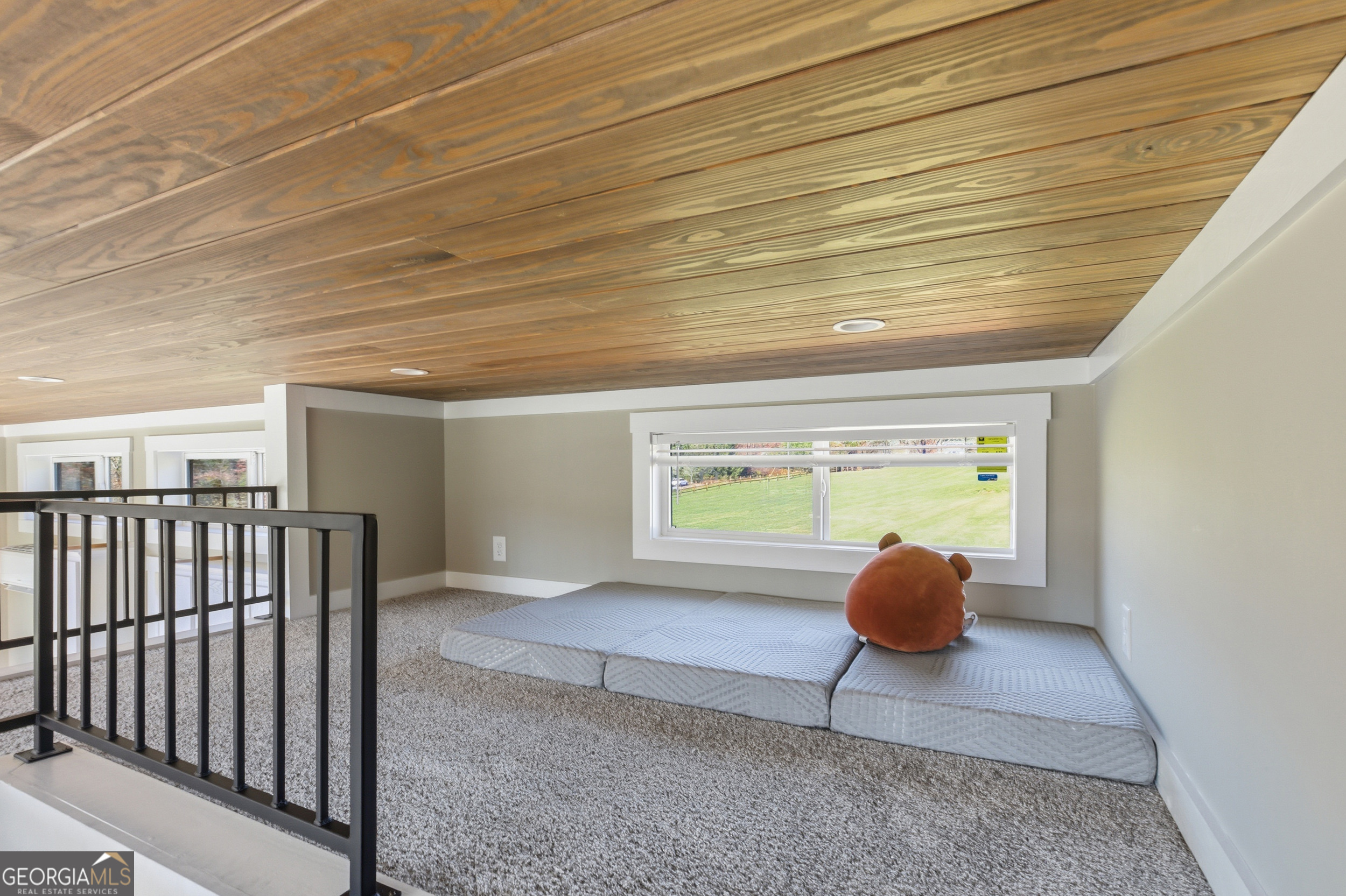 527 Saunders Road Franklin, NC 28734 - Photo 17 of 20 a view of an empty room and window