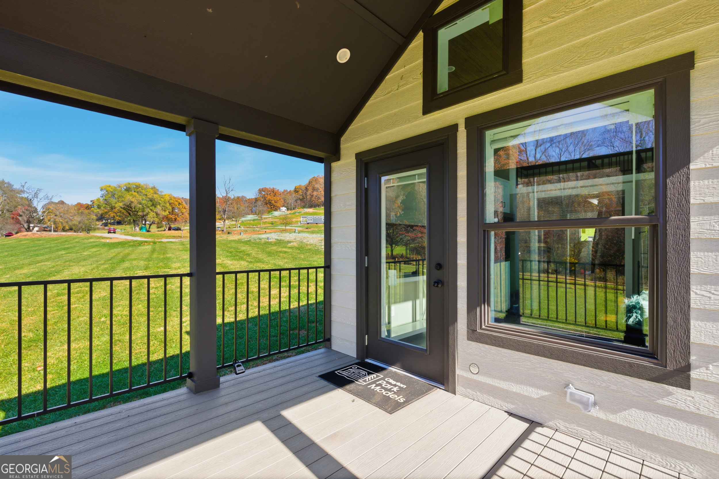 527 Saunders Road Franklin, NC 28734 - Photo 6 of 20 a view of a brick house with a large window