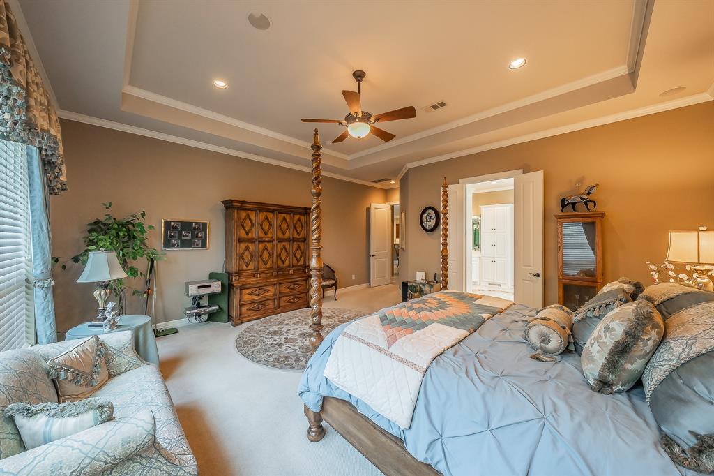 2726 Country Club Road Pantego, TX 76013 - Photo 16 of 26 a bedroom with a bed window and couch