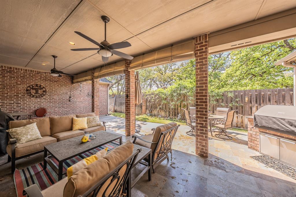 2726 Country Club Road Pantego, TX 76013 - Photo 24 of 26 a living room with furniture and a large window