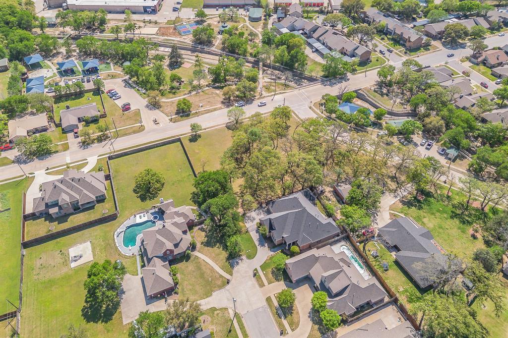 2726 Country Club Road Pantego, TX 76013 - Photo 26 of 26 an aerial view of houses with yard