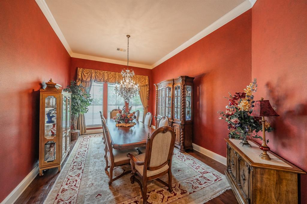 2726 Country Club Road Pantego, TX 76013 - Photo 3 of 26 a dining room with furniture and a potted plant