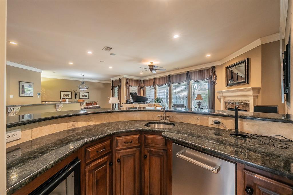 2726 Country Club Road Pantego, TX 76013 - Photo 10 of 26 a kitchen with lots of counter top space and a sink