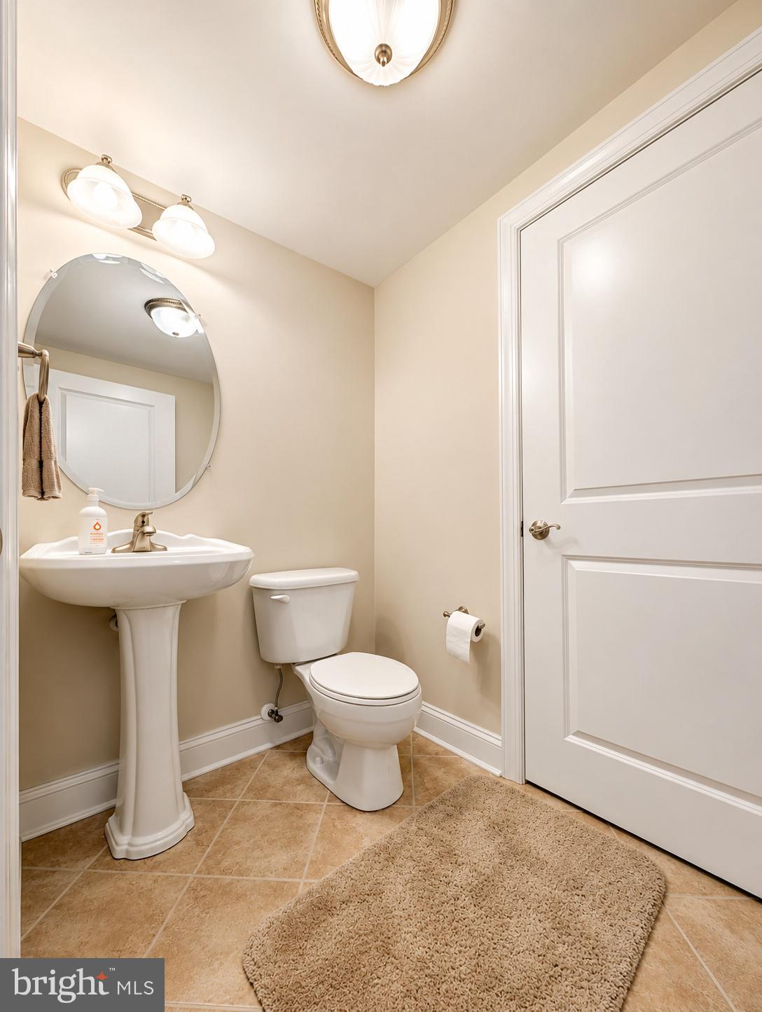 530 Riverside Drive, Unit 405 Salisbury, MD 21801 - Photo 21 of 40 Half bath w/ an additional storage closet