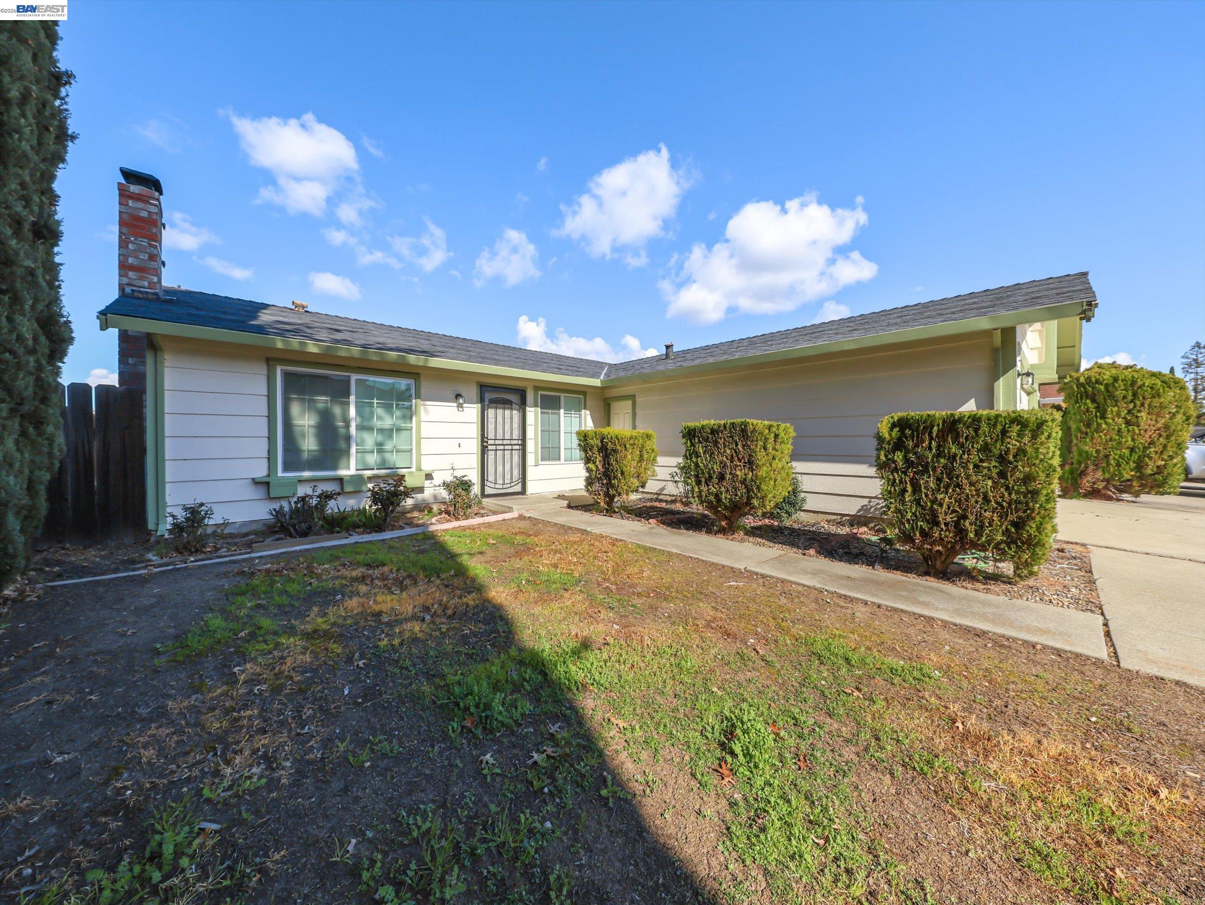 3432 Danielle Place Bay Point, CA 94565 - Photo 2 of 36 a front view of a house with garden
