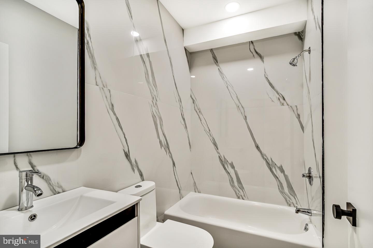 182 East Huntingdon Street Philadelphia, PA 19125 - Photo 11 of 41 a bathroom with a sink toilet and shower