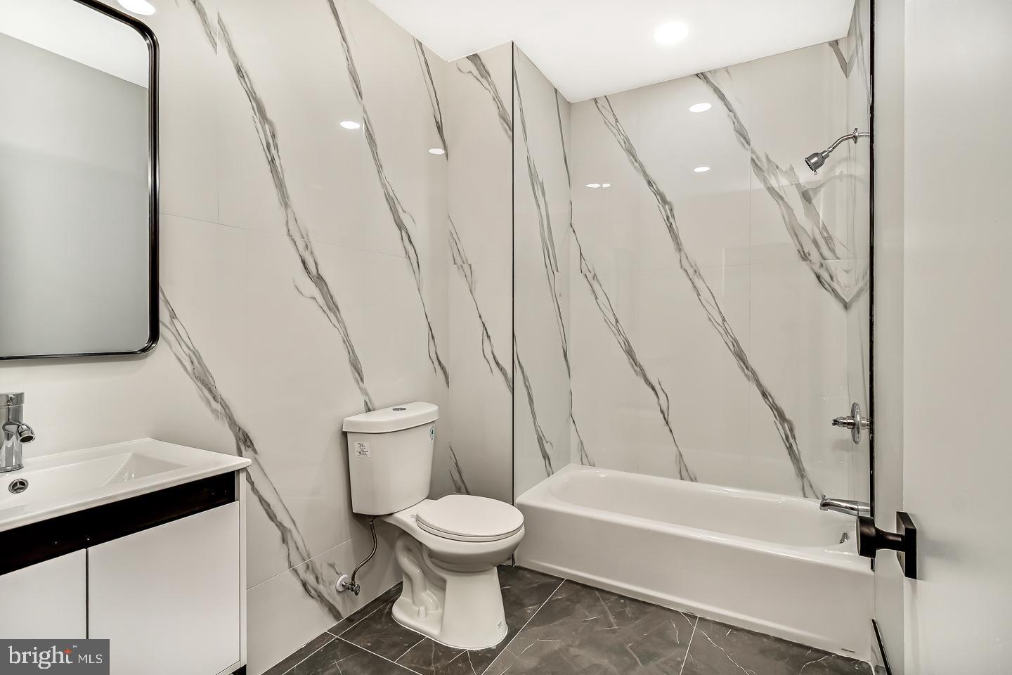 182 East Huntingdon Street Philadelphia, PA 19125 - Photo 8 of 41 a bathroom with a toilet and a bathtub
